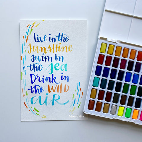 Watercolor lettering and a watercolor pan