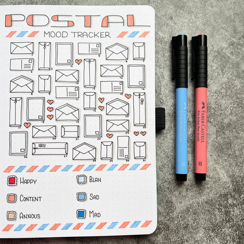 Bullet Journal with postal mood tracker icons and Pitt Artist Pens