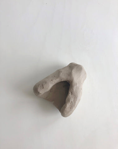 Clay with small opening