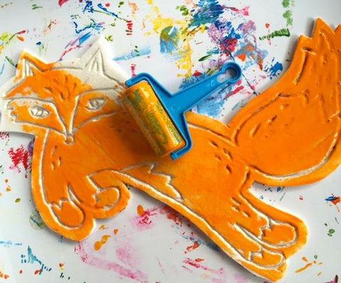 Painted styrofoam fox with brayer