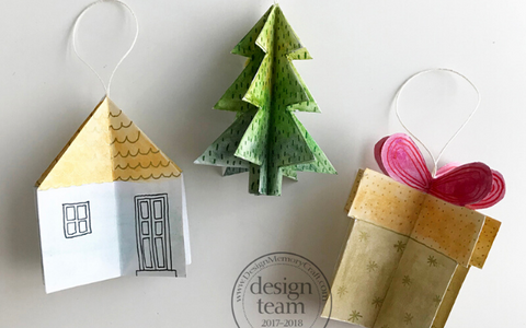 Handmade Christmas ornaments: a house, Christmas tree, and Christmas present