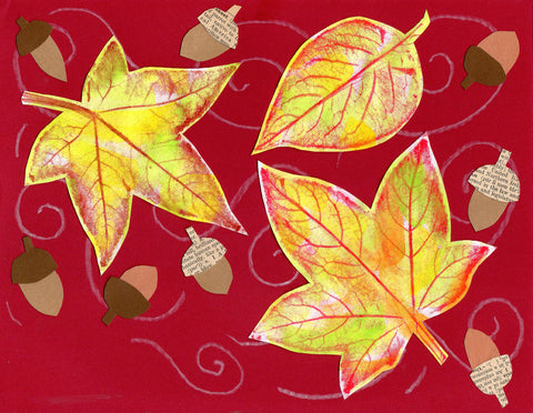 Watercolor paint leaves on construction paper