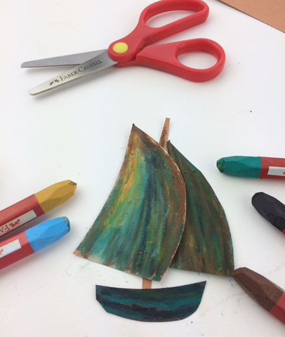 Construction paper boat with oil pastels