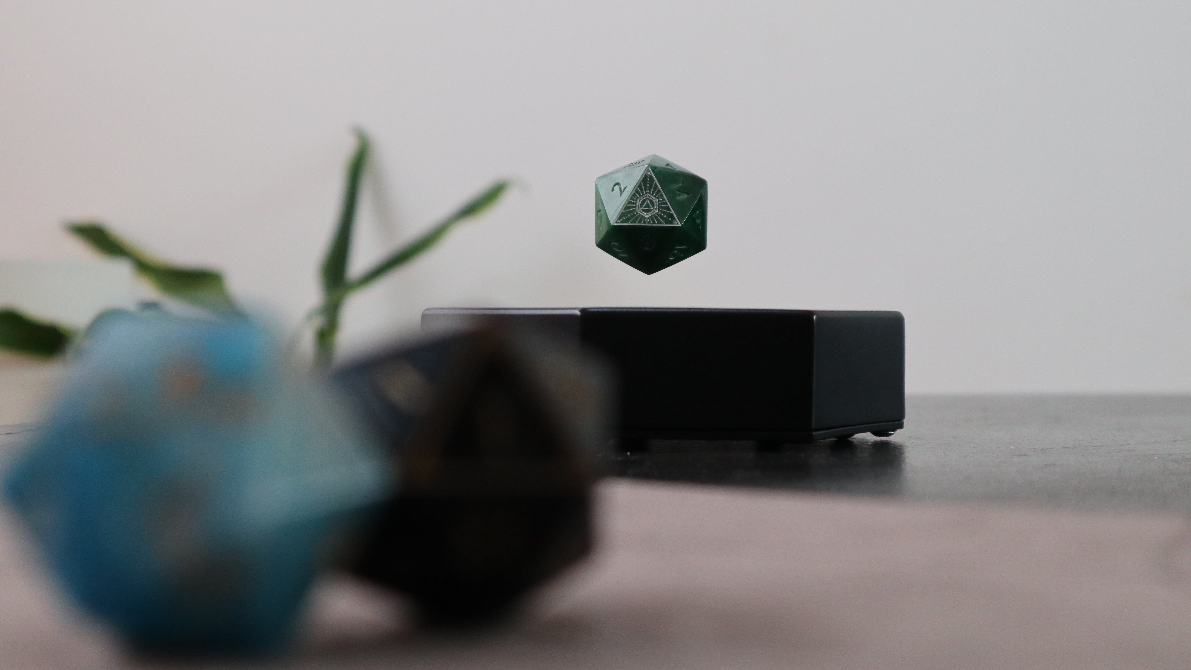Floating dice with two more Ascendice d20s in the foreground