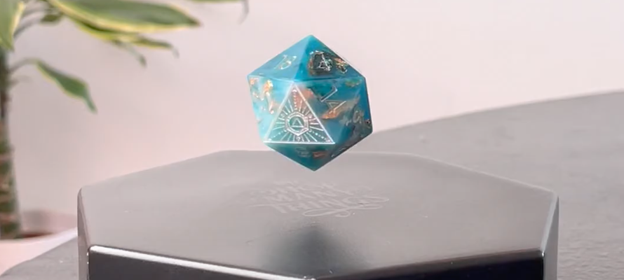 Blue floating d20 above black base