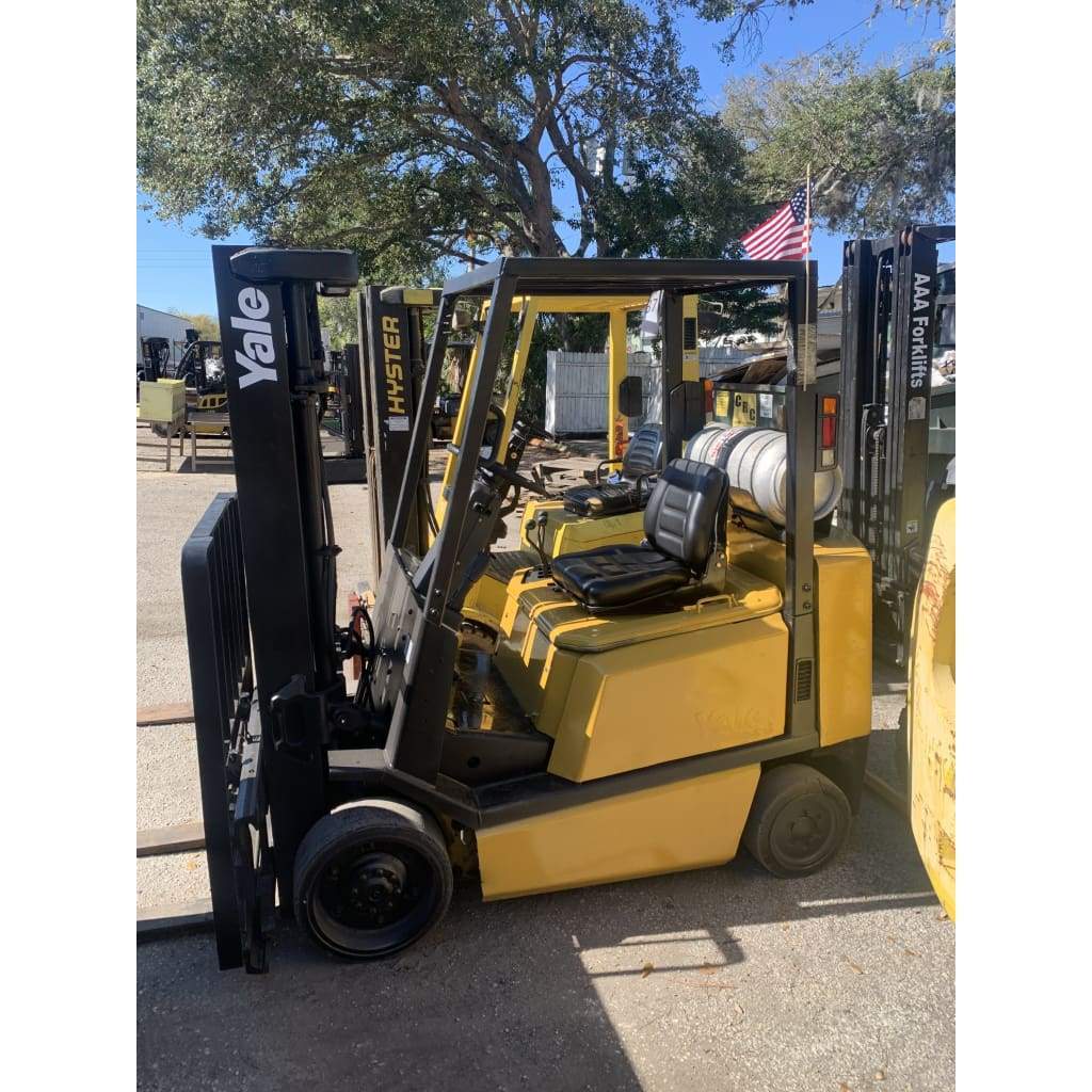 https://cdn.shopify.com/s/files/1/0049/7139/7235/products/yale-glc050rg-5000lb-lpg-forklift-w-sideshift-194h-cushion-tires-5000lbs-forklifts-lift-trucks-sold-aaa-truck-vehicle-495.jpg