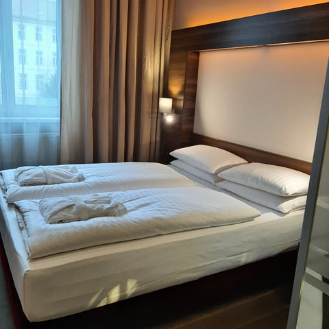 Scandinavian Sleeping Method two duvets side by side on one bed