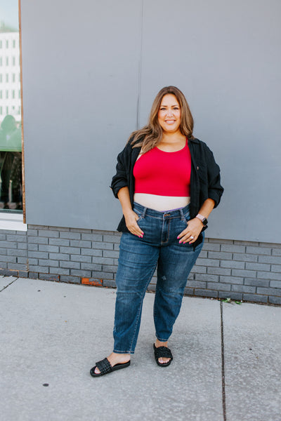 Plus size woman models relaxed slim straight jeans