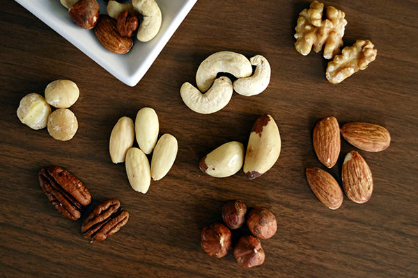 A table full of mixed nuts. 