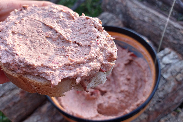 Wine-braised paté spread on crusty bread.