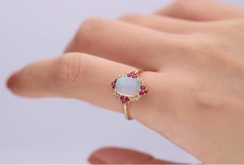 A 14k rose gold opal ring 