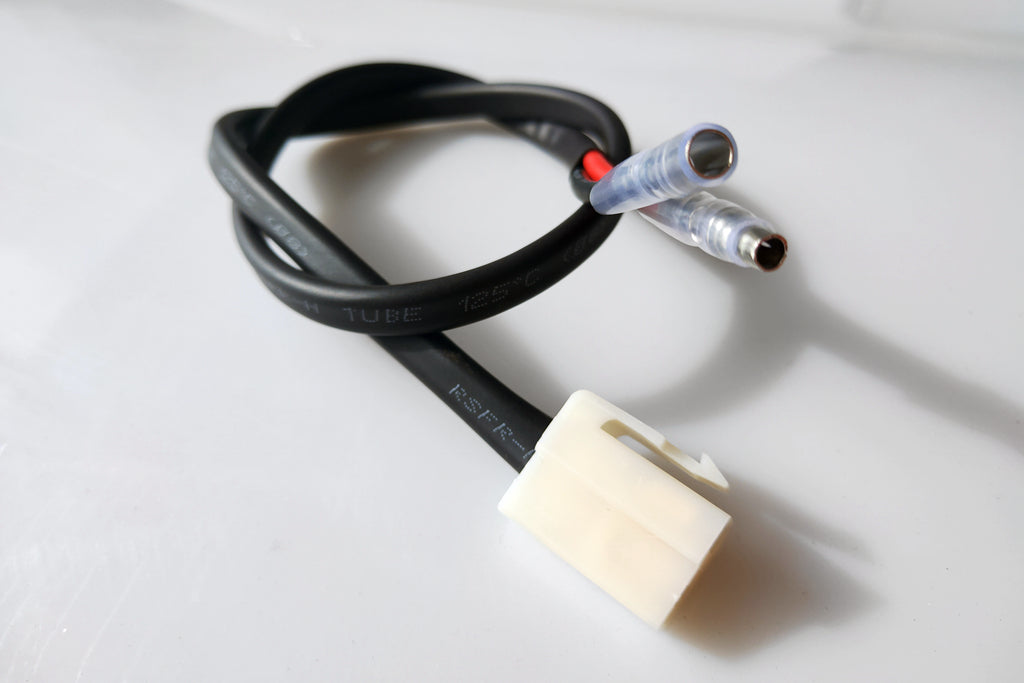 Power cord adapter for bullet connector