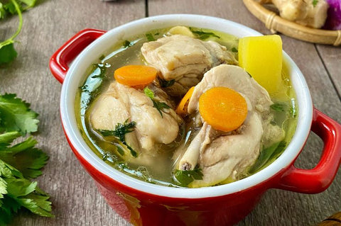 chicken bone broth with celery, carrot and onions