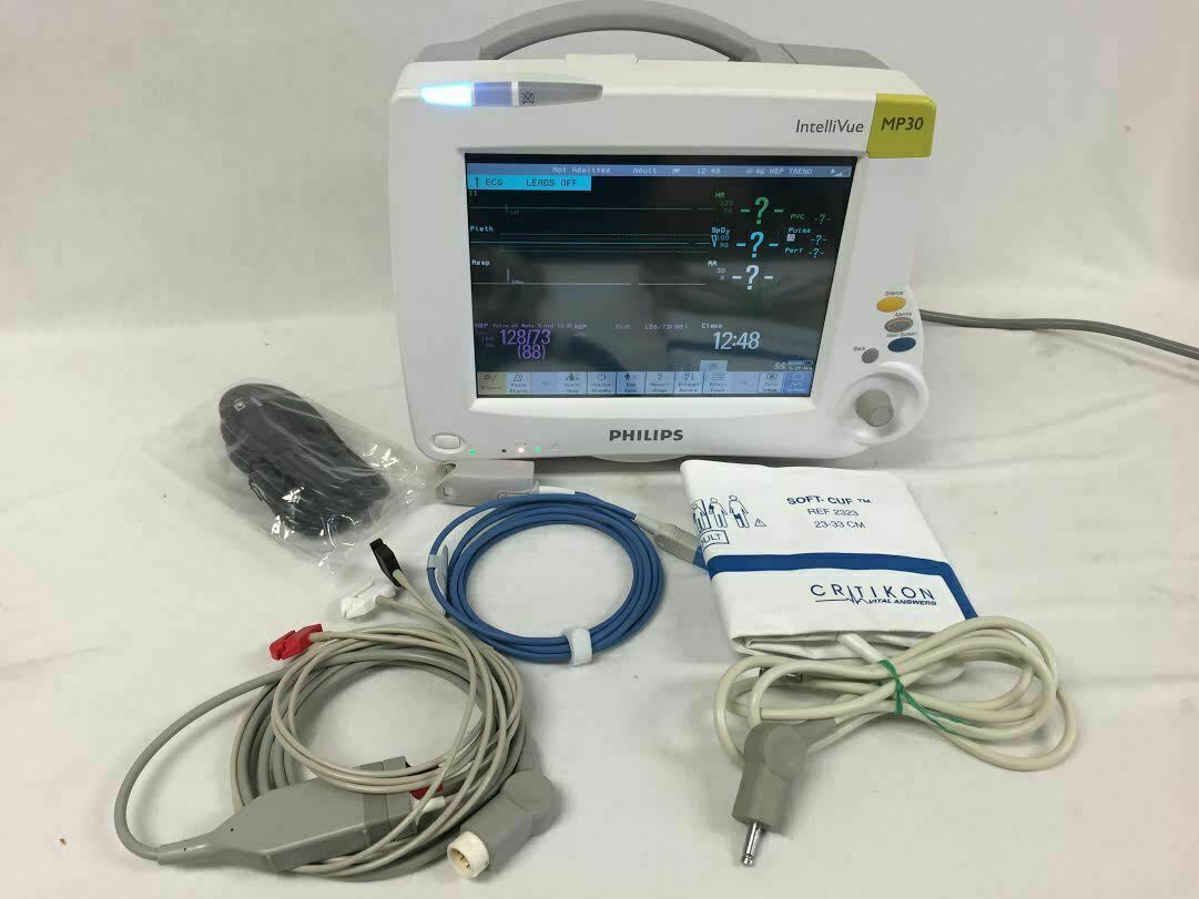 A photo of a bedside patient monitor in use at a medical surgical