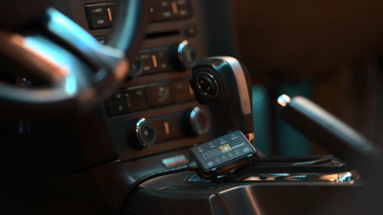 Pedal Commander Throttle Response Controller, installed on a vehicle.