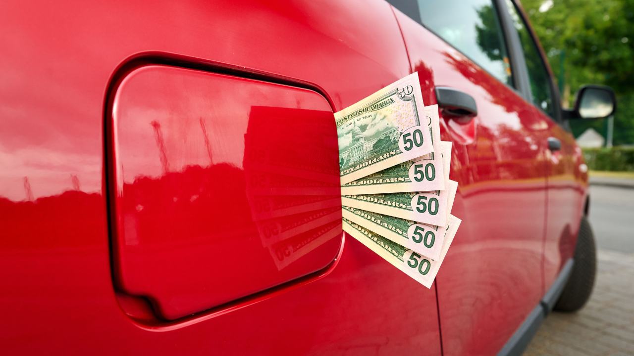 50 dollar bills on car fuel lid