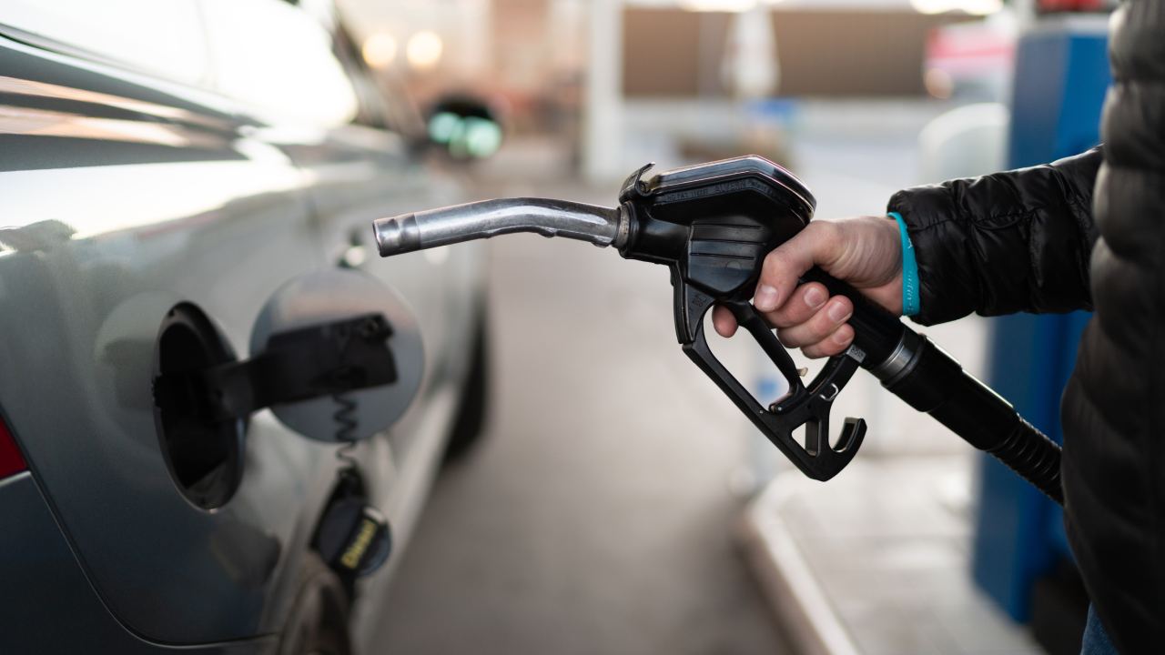 man filling car's fuel