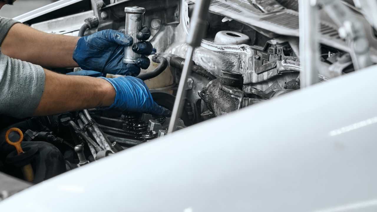 mechanic checking the car