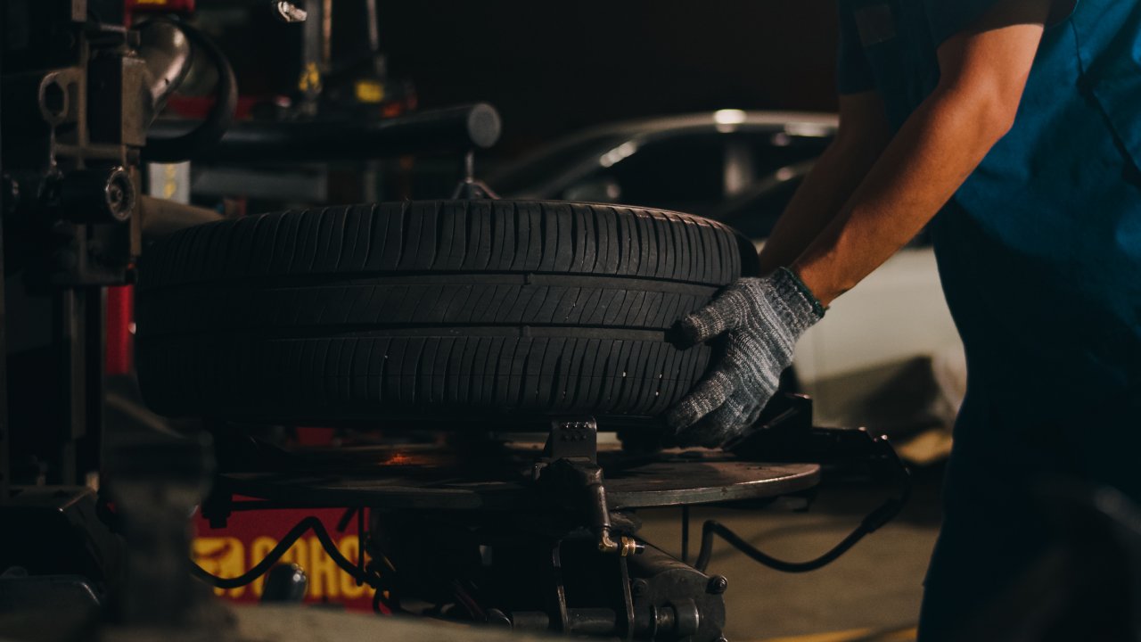 man-handling-car-tire