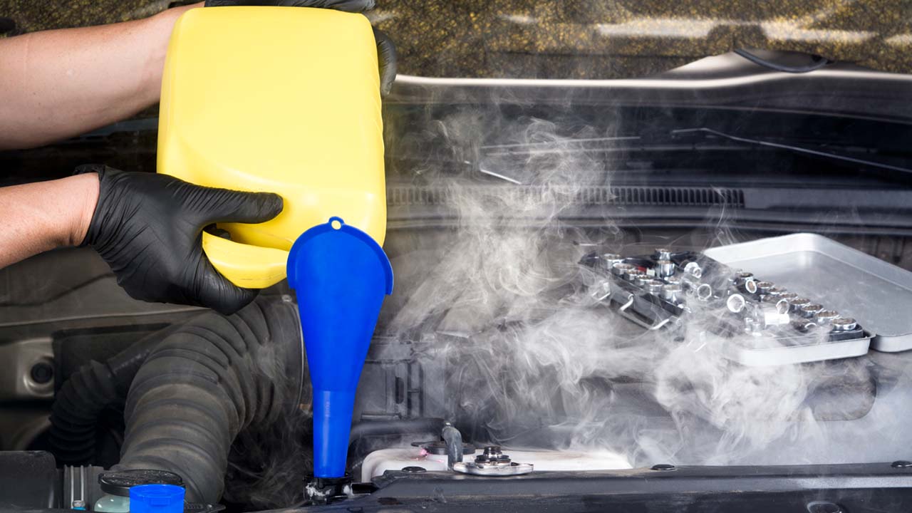 car-radiator-getting-filled-with-fluid