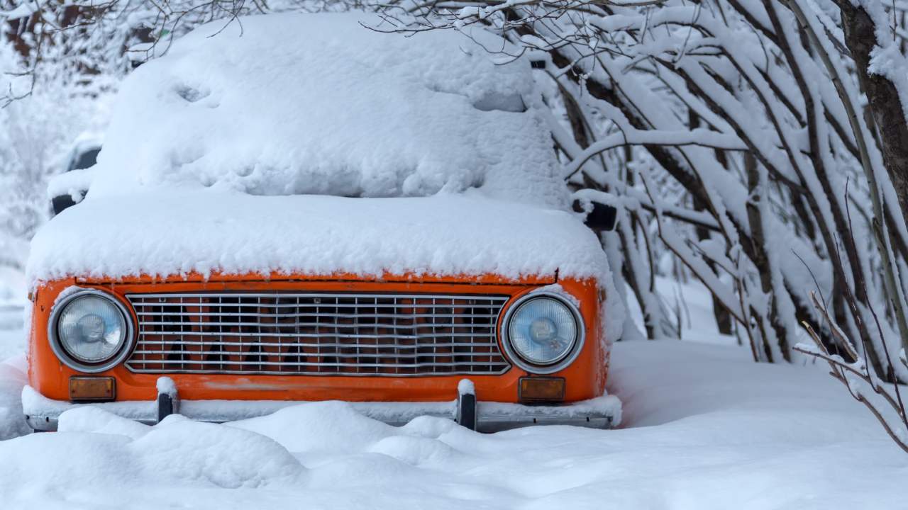 orange-truck-covered-with-snow