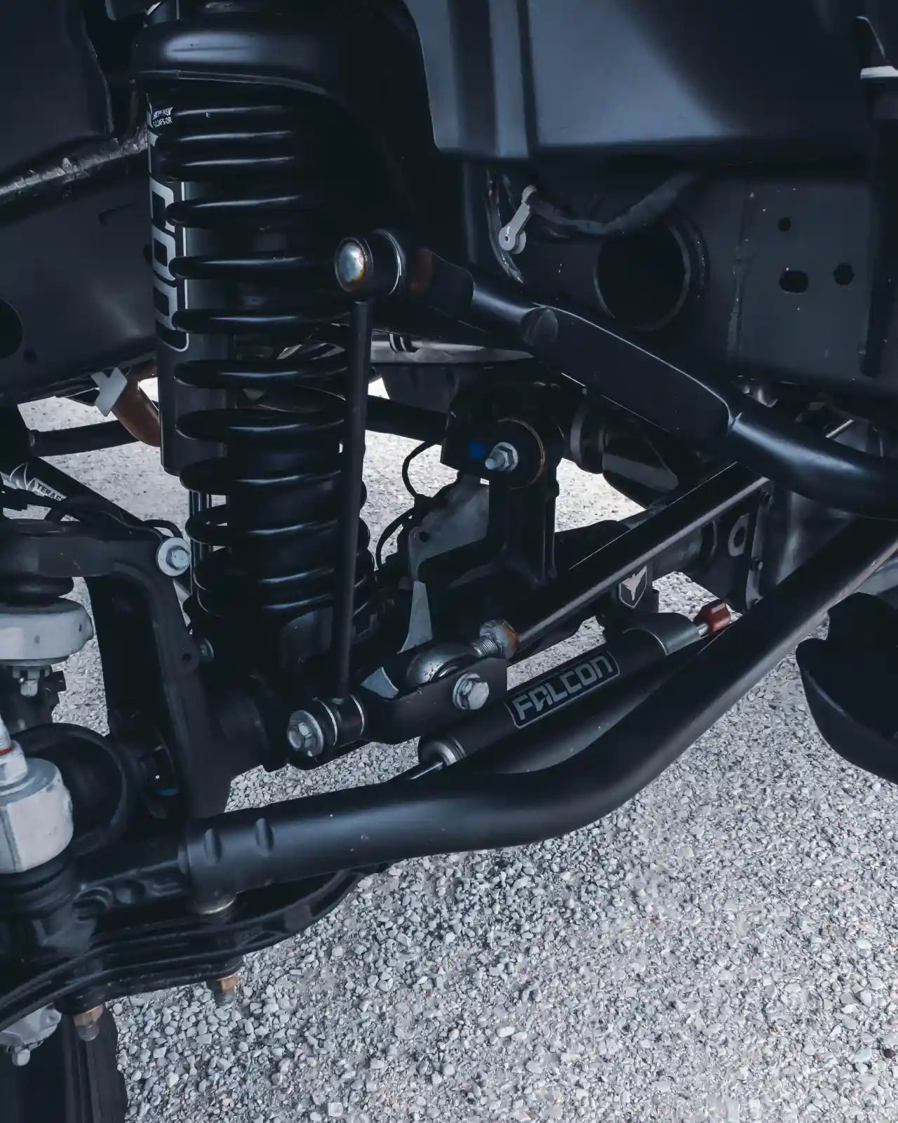 A black aftermarket suspension system