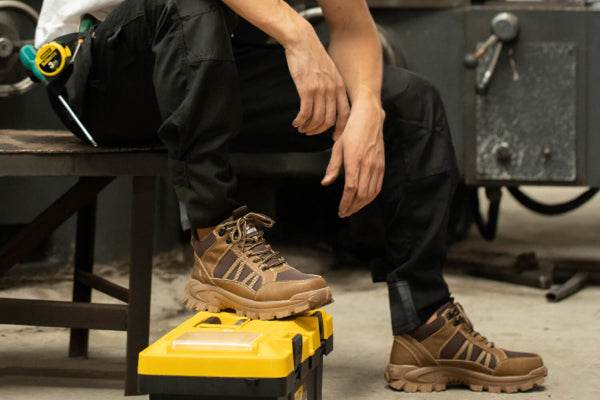 Laborer wearing Fable Brown Indestructible Shoes