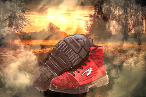 Depict a path clearing from fog into a bright sunrise, with a pair of Indestructible shoes positioned at the path's beginning.