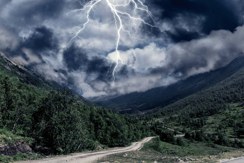 A challenging environment, such as a rocky path or a stormy landscape.