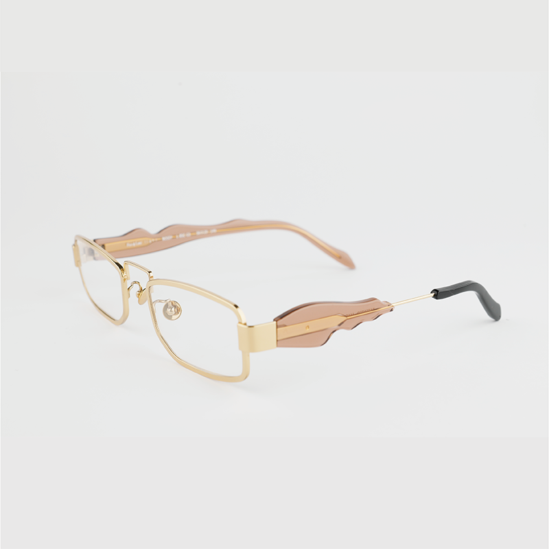 gold colour titanium rectangle optical frame with toffee colour acetate temples and a black tip 45 angled