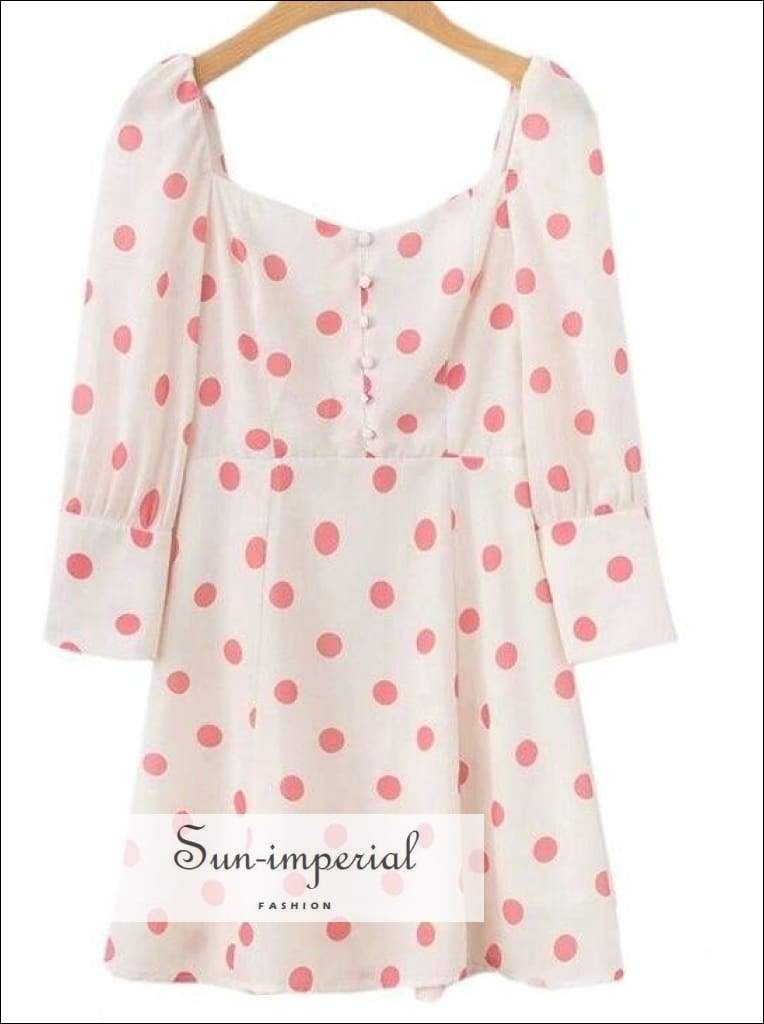 white dress with pink polka dots