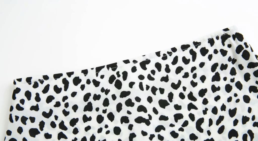 White Cow Print Mini Skirt