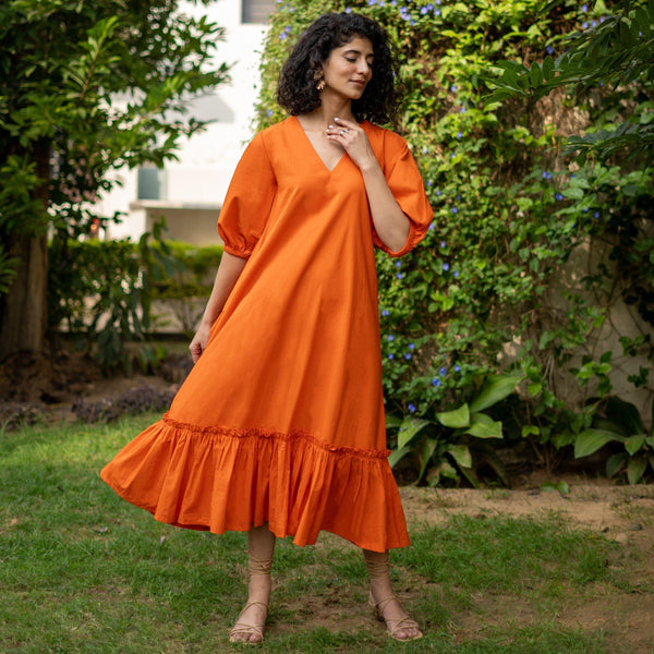 https://cdn.shopify.com/s/files/1/0050/3264/0601/files/orange-cotton-poplin-a-line-deep-neck-maxi-tier-dress-a-line-dress-896654_600x.jpg?v=1709638280