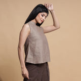Right View of a Model wearing Brown and Beige Reversible Yoke A-Line Top