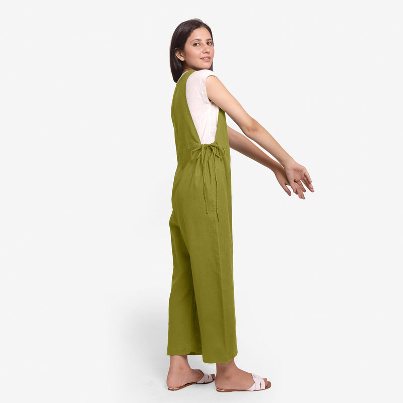 Back View of a Model wearing White Straight Top and Olive Jumpsuit Set