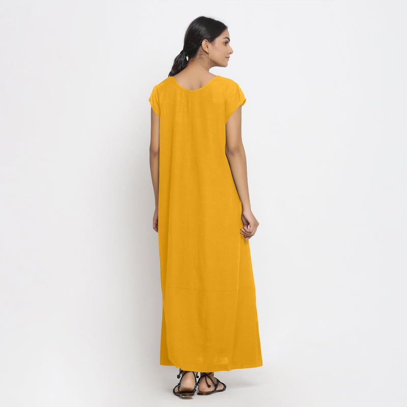 Back View of a Model wearing Yellow Cotton Flax A-Line Paneled Dress