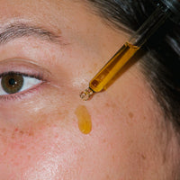Close up of Active Botanical Serum on skin.
