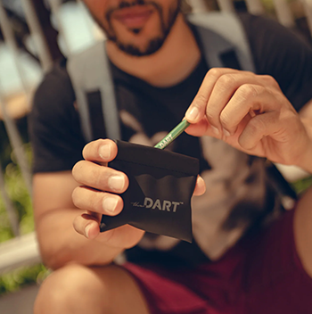 A person using a smell proof bag to protect their accessories