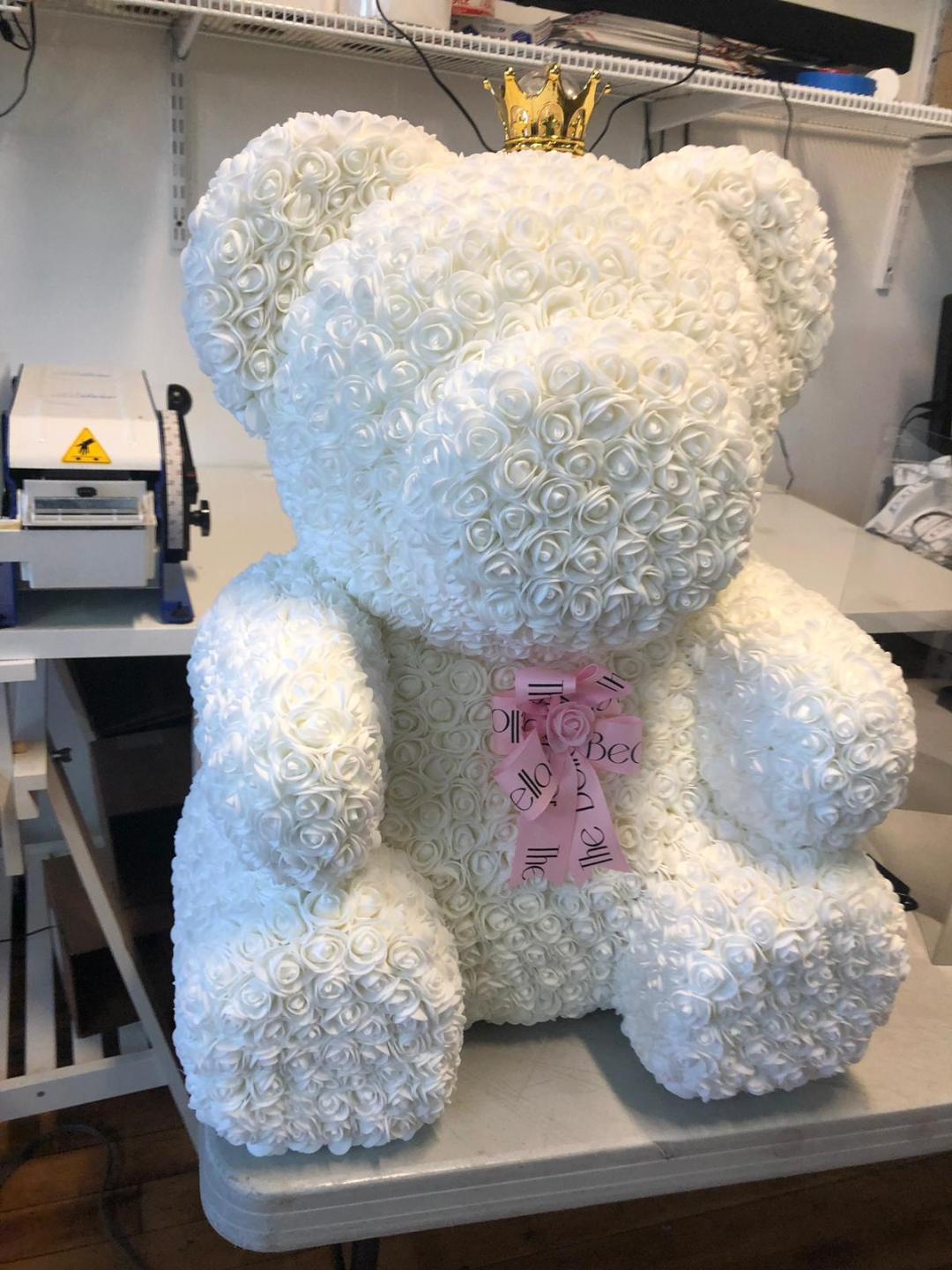 giant teddy bear with roses