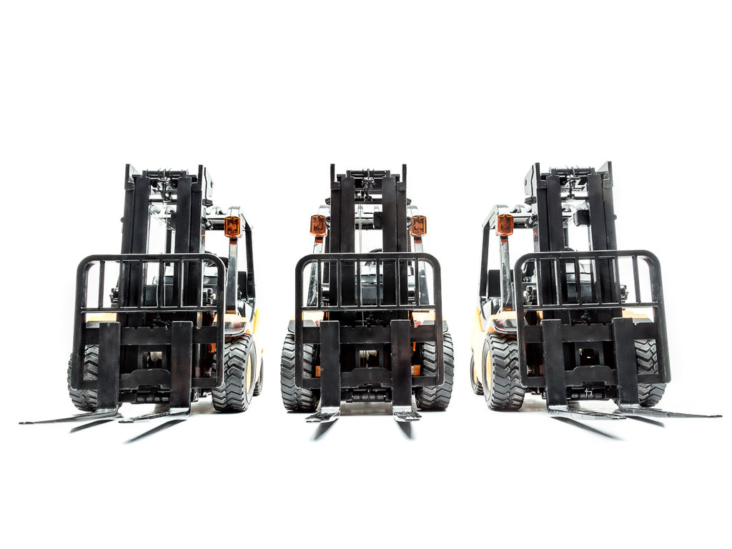 three forklifts with white background