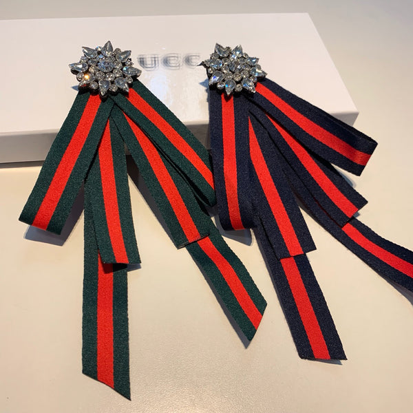 gucci ribbon brooch