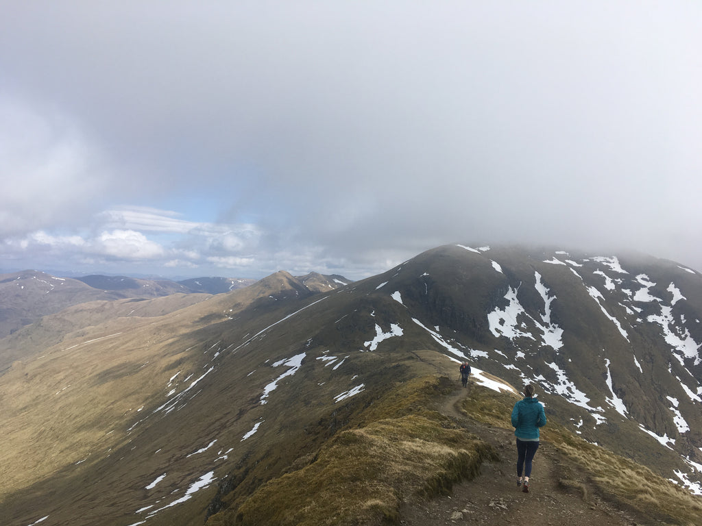  Jess on her way up to Ben Lawers lost somewhere in the cloud. Photo: Erik Schulte