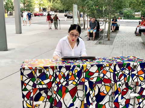 Sisi Liu performing on a public piano in New York City
