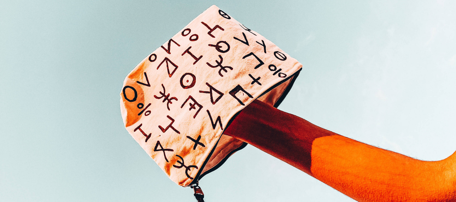 Tifinagh alphabet on a purse