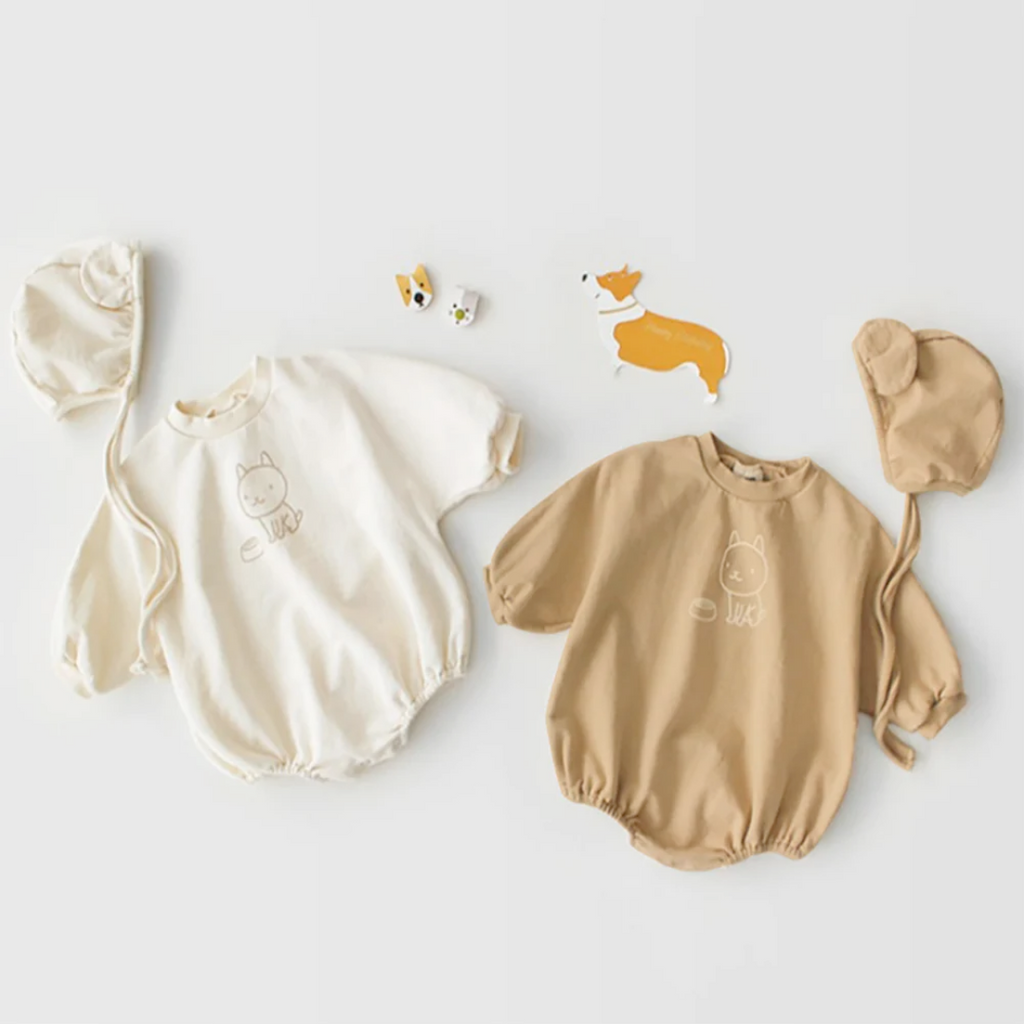 Two sets of rompers with a puppy design