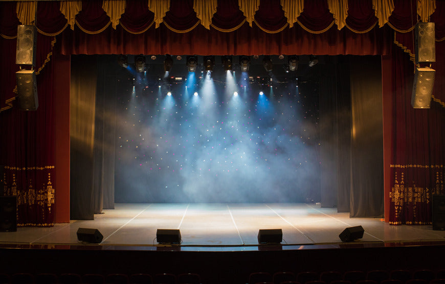 An-empty-stage-of-the-theater-lit-by-spotlights-and-smoke-before-the-performance
