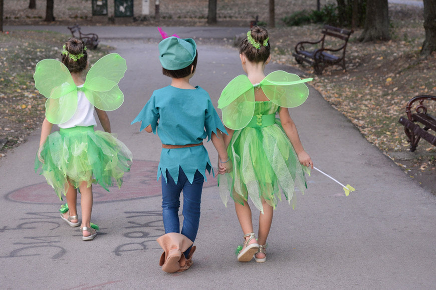 Boy-dressed-as-Peter-Pan-and-two-girls-dressed-as-fairies