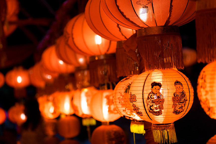 Chinese-lanterns-at-night-Chinese-New-Year-decorations-text-means-good-luck