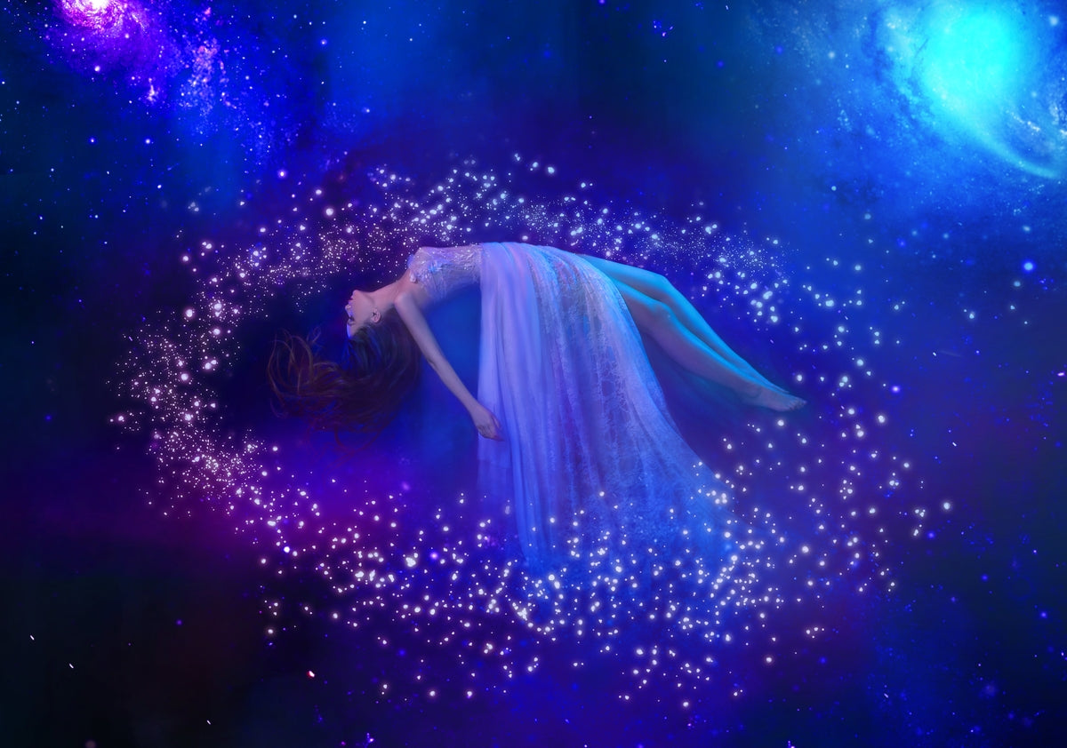 Drawing of a woman floating with the stars
