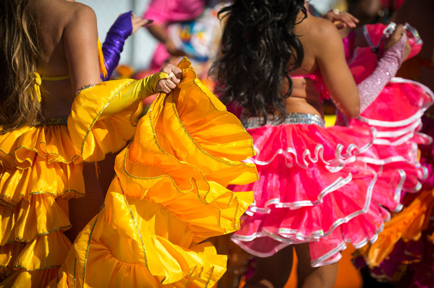 Sunny-close-up-of-the-colorful-ruffled-dresses-of-Carnival-costumes-dancing-in-bright-sunlight-in-Rio-de-Janeiro-Brazil.